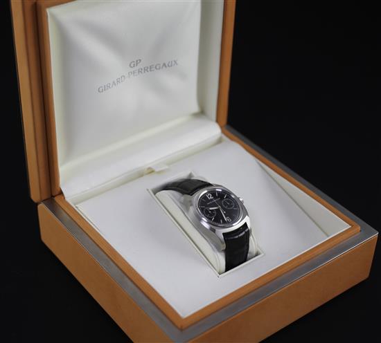A gentlemans stainless steel Girard Perregaux automatic chronograph wrist watch, with original box.